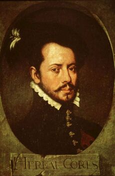 Pintura de un joven barbudo mirando ligeramente hacia la derecha. Lleva una chaqueta oscura con un cuello alto coronado por una gorguera blanca, con botones ornamentados en la parte delantera. La pintura es oscura y se encuentra en un óvalo con las letras "HERNAN CORTES" en un rectángulo debajo.